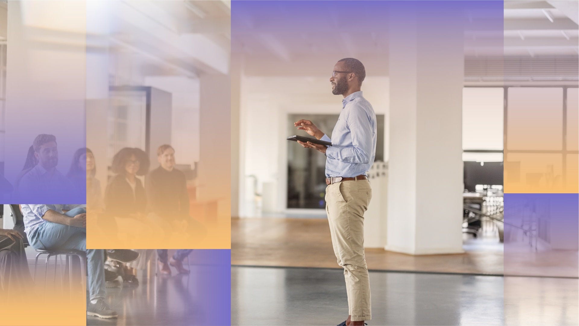 A person stands in a modern office space holding a tablet, presenting or reviewing information, with seated colleagues visible in the background and soft geometric color overlays layered across the image.