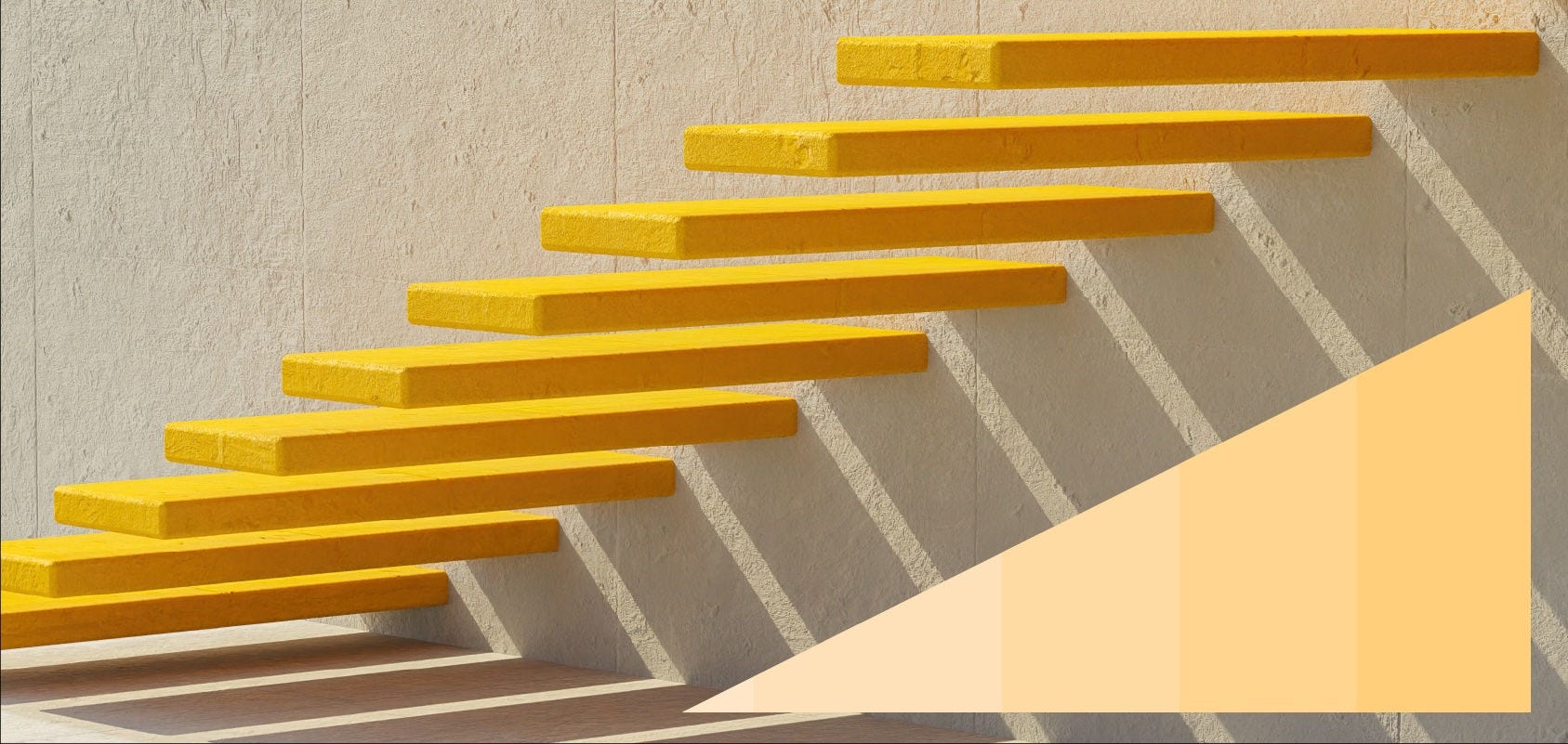 Behind view of a staircase against a stone wall.
